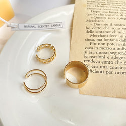 Collection of Gold Color Round Hollow Geometric Rings in a gallery layout