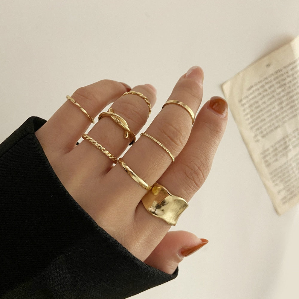 Collection of Gold Color Round Hollow Geometric Rings in a gallery layout