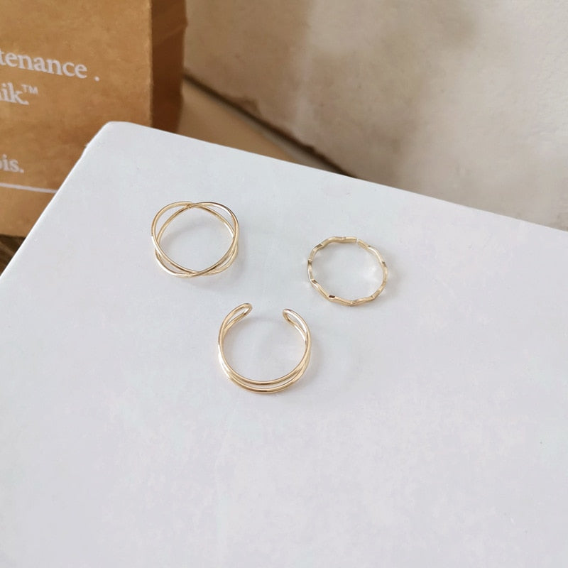 Collection of Gold Color Round Hollow Geometric Rings in a gallery layout