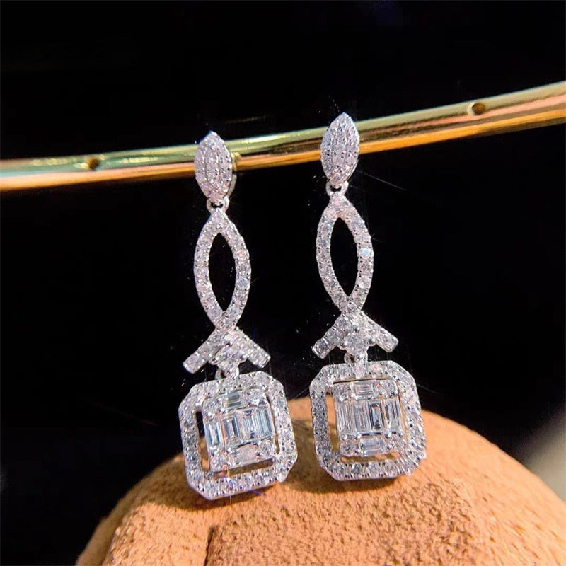 Collection of sterling silver Wedding Drop Earrings in a gallery layout