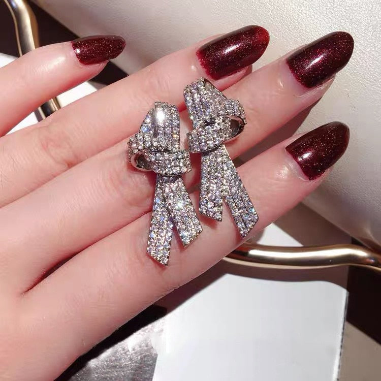 Collection of sterling silver Wedding Drop Earrings in a gallery layout