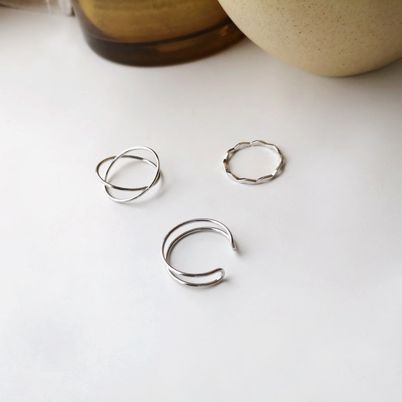 Collection of Gold Color Round Hollow Geometric Rings in a gallery layout